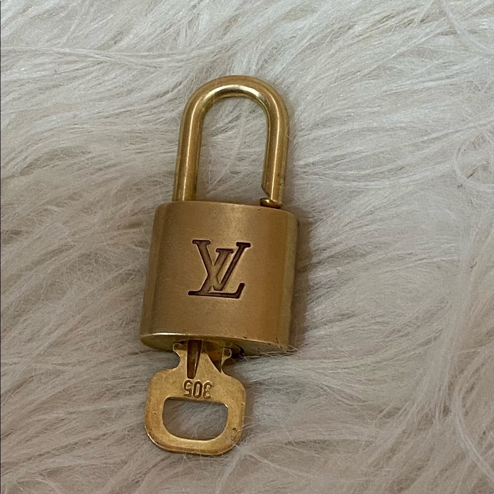 Authentic Louie Vuitton lock and key